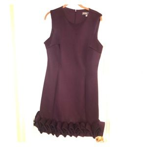 Plum scuba sheath dress with ruffle bottom